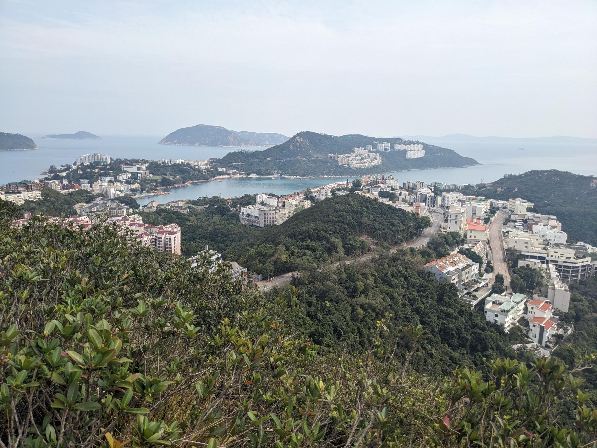 View on bright buildings dotting the coastline, with islands in the background. View on bright buildings dotting the coastline, with islands in the background.