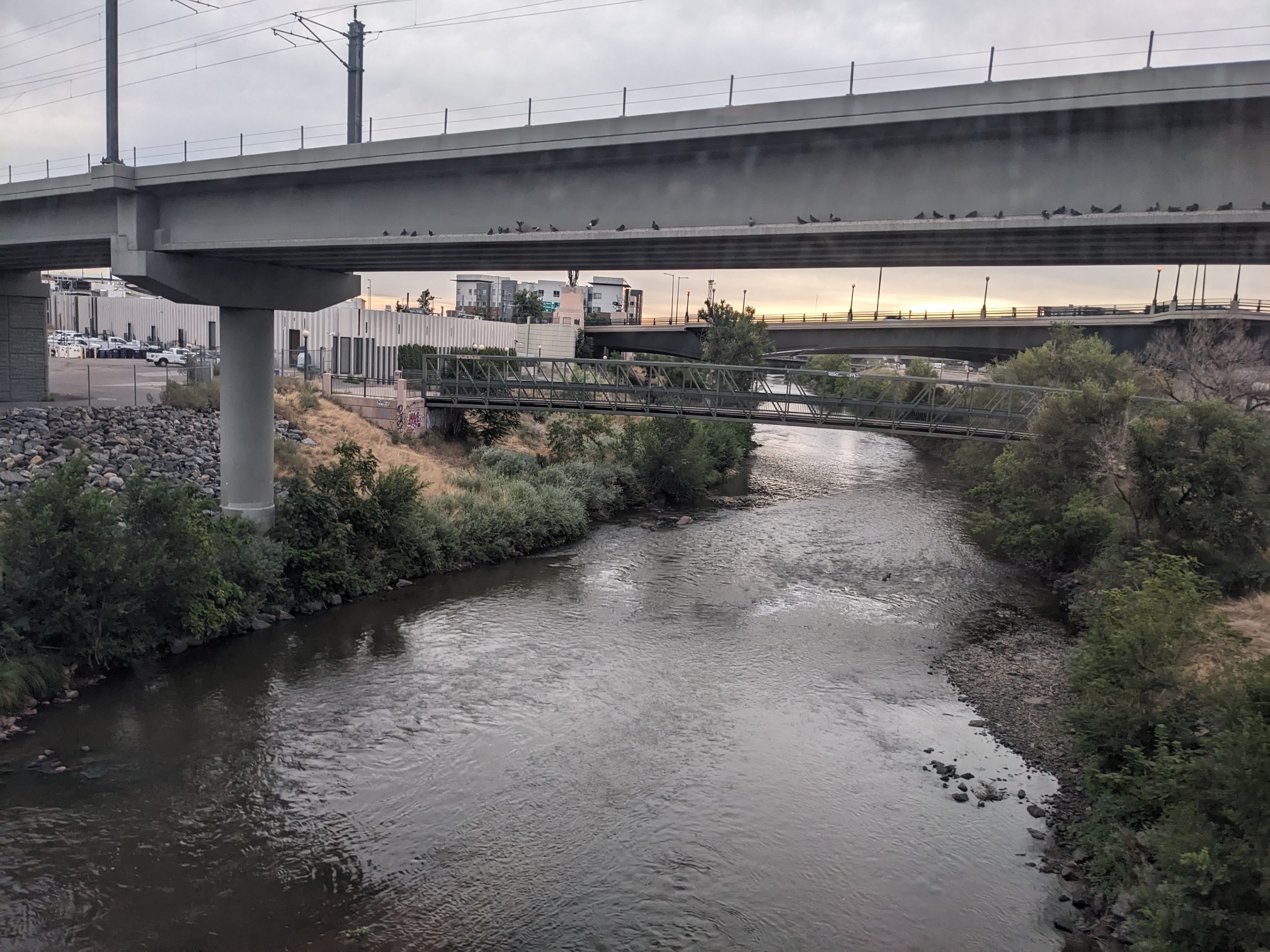 A bridge over a river in the morning.