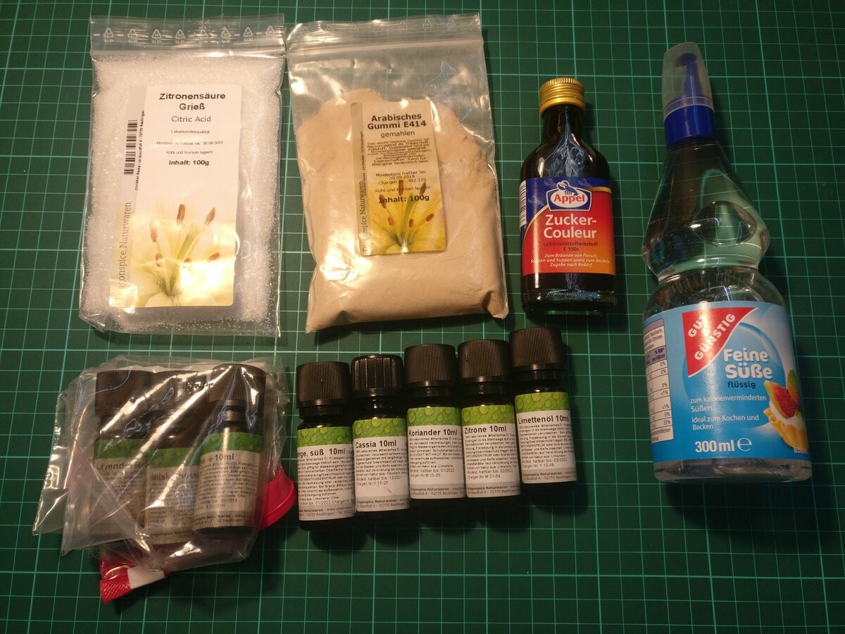 An overview of the required ingredients: Citric acid, gum arabic, caramel color, and sweetener.