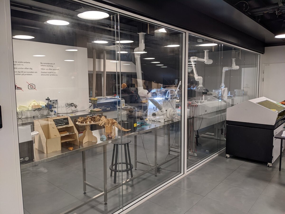 A making space behind glass windows.